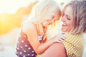 Mother-Daughter-Smiling-Laughing