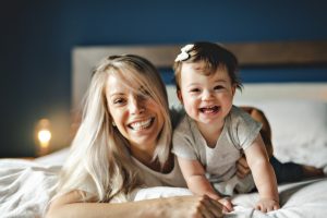 Mom-and-Daughter-Laughing-Playing